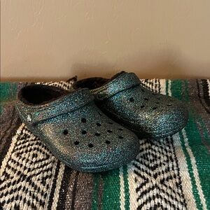 CROCS Sparkly green lined slip on shoes size 7